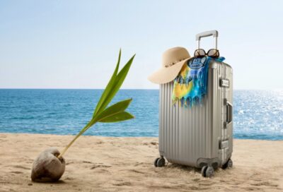 Suitcase on beach in Hawaii