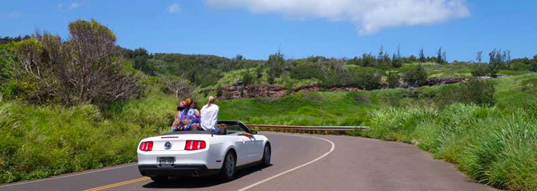 Young drivers on a car in Hawaii