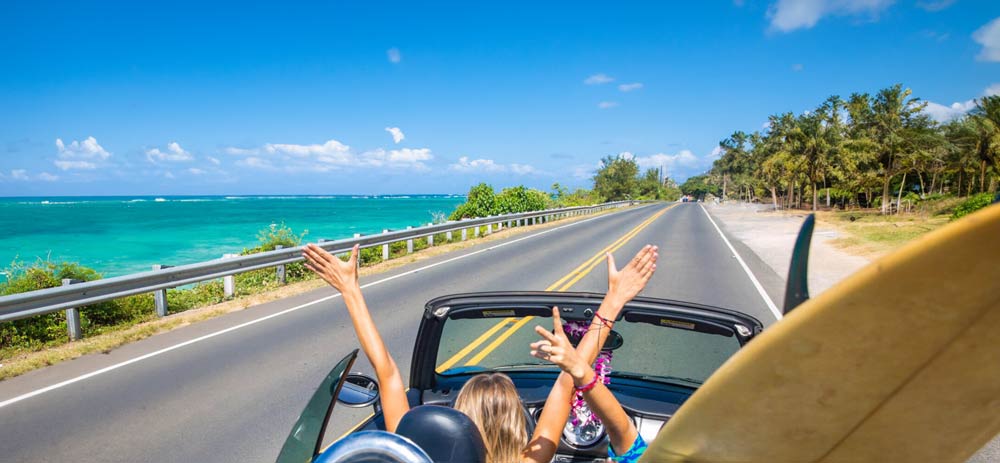 Waving arms while driving in Hawaii