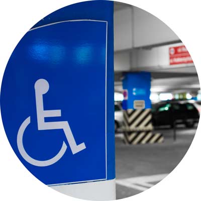 Handicapped sign in car rental lot